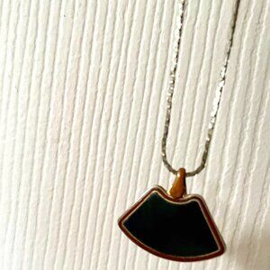 Black fan-shaped Laurel Burch necklace
